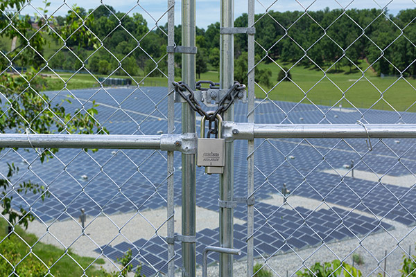 Padlock on a fence gate